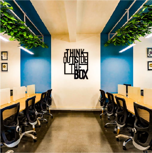 coworking spaces wall photo that says think outside the box